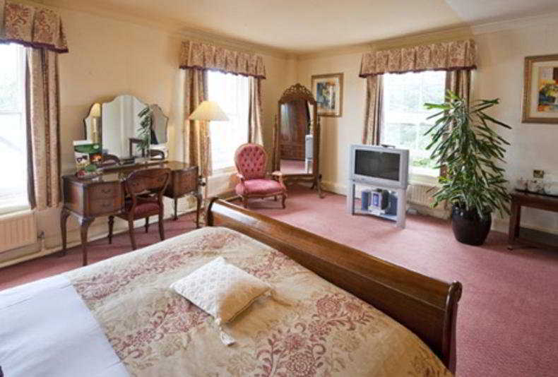 George Hotel By Greene King Inns هنتينجتون الغرفة الصورة
