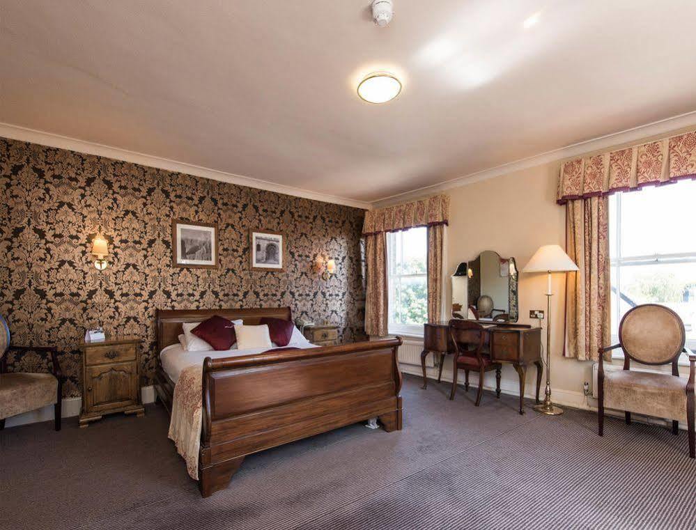 George Hotel By Greene King Inns هنتينجتون المظهر الخارجي الصورة